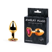 Золотистая анальная пробка с малиновым кристаллом-сердечком - 7 см. - Anal Jewelry Plug - купить с доставкой в Новочебоксарске