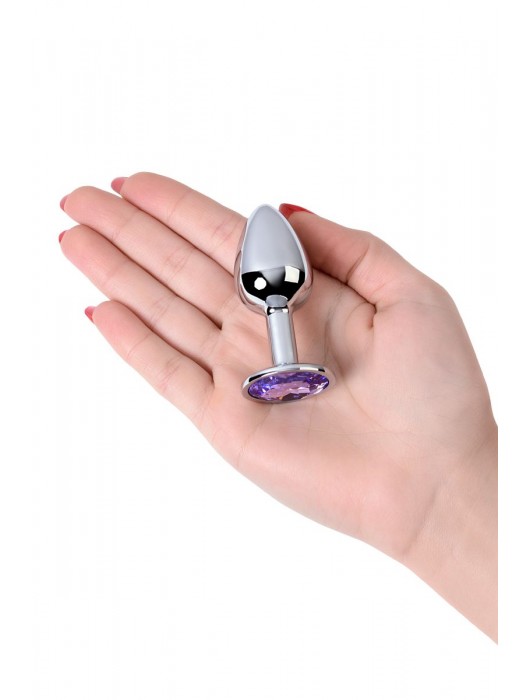 Серебристая конусовидная анальная пробка с фиолетовым кристаллом - 7 см. - ToyFa - купить с доставкой в Новочебоксарске